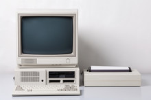Old Personal Computer. The System Unit, Floppy Drive, CRT Monitor, Printer And Keyboard On White Background.