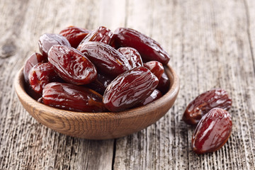 dates fruit on a wooden background