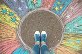 Fototapeta  - Comfort zone concept. Feet standing inside comfort zone circle.