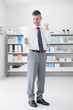 © stokkete - Cheerful businessman receiving good news