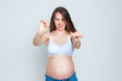 © samoilova - Concept image of pregnant woman breaking a cigarette. Stop smoking!