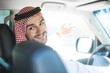 © rodjulian - Portrait of a handsome arabian man driving a car