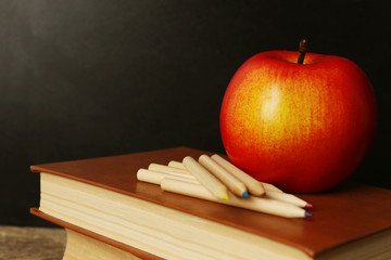 Poster - School books on desk near chalkboard