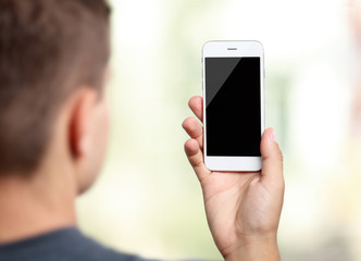 Sticker - Young man with gadget on blurred background