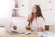 © Prostock-studio - Woman has healthy business lunch in modern office interior