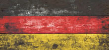 German Flag Painted On Old Wood Plank Background.