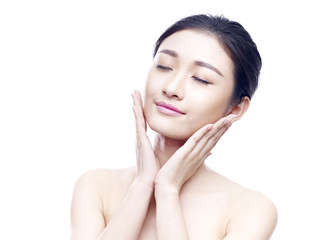 studio portrait of young asian woman, isolated on white background