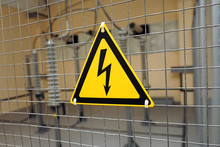 Yellow Triangular Sign Of Electrical Hazards.
