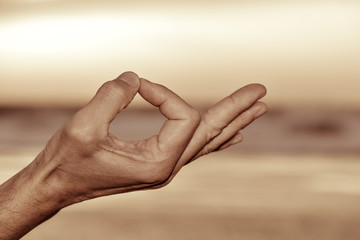 hand of a man in gyan mudra