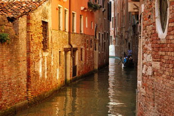 Canal of Venice and old buildings