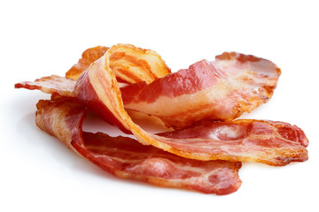 Wall Mural - Three strips of fried crispy bacon isolated on white.