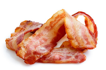 Wall Mural - Three strips of fried crispy bacon isolated on white.