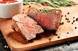 Medium Rare Filet mignon steak on wooden board, selected focus