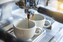 Coffee Machine Preparing Two Cups Of Coffee