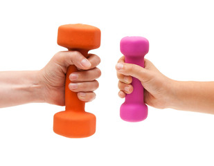 Colored dumbbells in the hands of children and adults on a white background