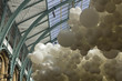 Close up of white balloons installation in Covent Market in London