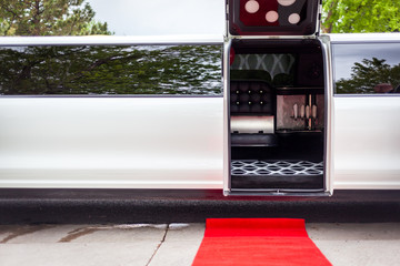 White limousine with inviting open door