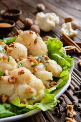 Poster - Vegetarian cauliflower with lettuce, walnuts, cinnamon, ground cloves, pepper and parsley