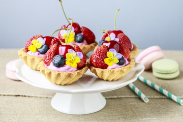 Sticker - Cupcakes with fresh fruits and edible flowers.