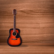 © releon8211 - Classical guitar on wood background