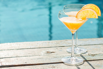 Wall Mural - cocktail on the pool nosing at the tropical resort