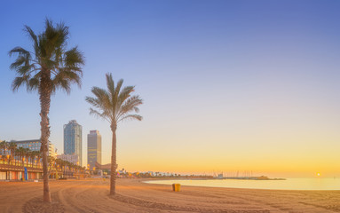 Wall Mural - barceloneta beach in barcelona at sunrise