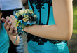 Pretty turquese and black wrist corsage worn to the prom.