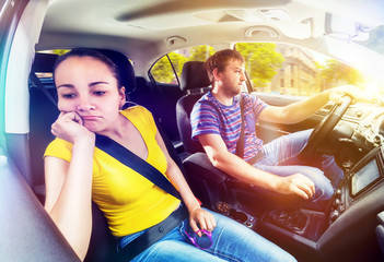 Wall Mural - Couple travelling by car