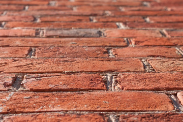 Red brick wall close-up