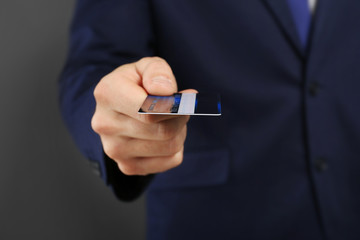 Poster - Businessman with credit card, closeup