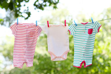 Baby Clothes Hanging On Clothesline