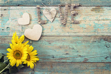 Background With  Sunflowers, Hearts And The Word Love On Old Woo