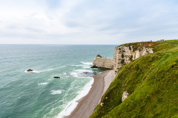 Canvas Print - The beach and stone cliffs in Etretat, France