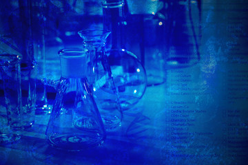 Wall Mural - laboratory glassware and test list on blue background