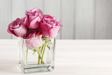 Wall Mural - Bouquet of pink roses in glass vase