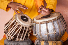 A Young Boy Playing On Traditional Indian Tabla Drums. 
