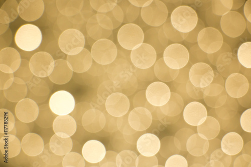 Fotografía Glowing golden bokeh background for designing purposes