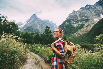 Canvas Print - Hiker walking to mountains