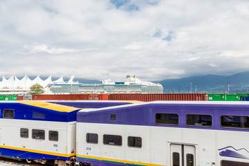 Passenger and Freight Train by Cruise Ship