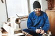 © veles_studio - A man working with woodcarving instruments