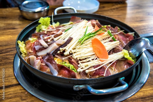 Fotografie, Obraz Korean-Style Hot Pot with Enoki Mushrooms and Pork