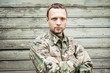 © evannovostro - Young military man in camouflage uniform