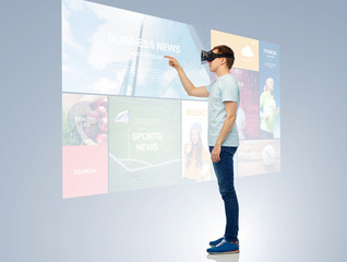 Wall Mural - happy man in virtual reality headset or 3d glasses