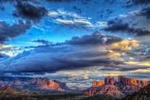 The Last Rays Of Sunlight Over Sedona Arizona With A Building Storm Moving In.