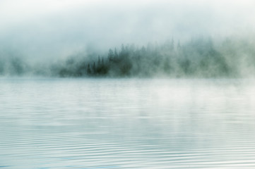 Heavy fog in the early morning on a mountain lake
Early morning on Yazevoe lake in Altai mountains, Kazakhstan 