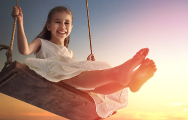 child girl on swing