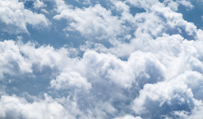 Wall Mural - Aerial view of big cloudy and sky from airplane,Nature backgroun