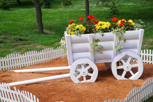 Flower Bed In A Decorative Wagon
