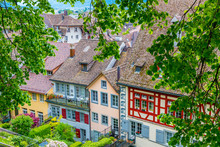 Colorful Houses With Red Tile Roofs In Rapperswil, Switlzerland.