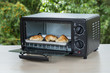 black toaster oven on natural background